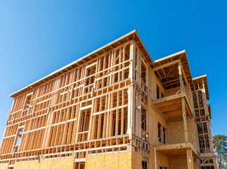 Wooden Framework Of New Apartment Building In Early Construction Phase