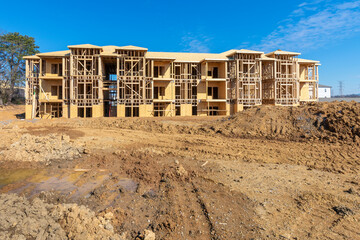 Wide Angle View Of New Apartment Building Under Construction