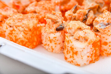 Sushi set. Set of rolls with sauce, shrimp and caviar.
