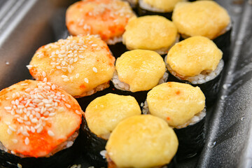 Sushi set. Various rolls, maki, nigiri in assortment in plastic packaging.