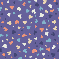 Colorful seamless pattern with heart confetti. Seamless vector background for Valentine's Day and other tenderness, used for fabric, packaging, wallpaper and more.