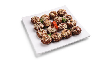 Studio shot of an arab dish falafel on a square white plate