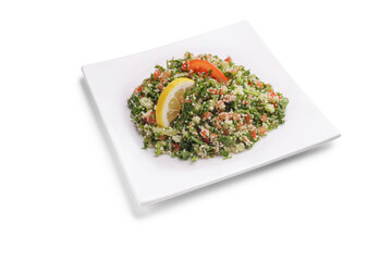 Arabic dish tabbouleh on a square white plate