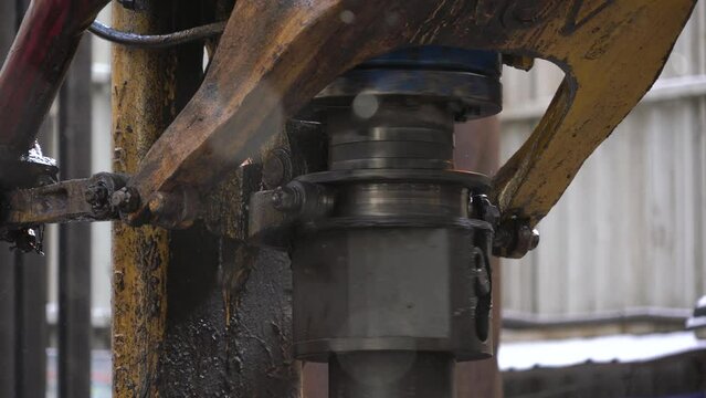 Drilling platform. Pipe rotates. Drilling process. Pipe Holder. Close-up
