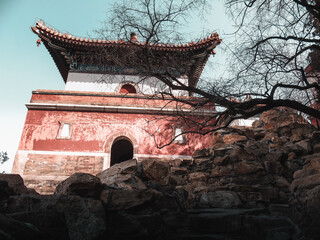 Chinese ancient buildings between rocks on the Longevity hill  in the Summer palace in Haidian District of Beijing