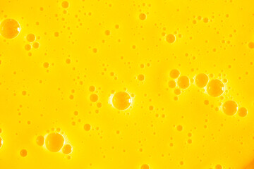 Orange juice. Bubble yellow texture background. Berry gel to cleanse the skin of the face and body....