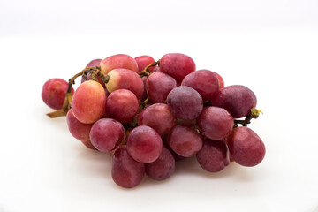 red grapes isolated on white