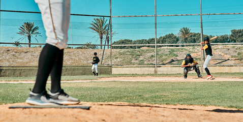 Theyre keeping their eyes on the ball. Shot of a group of baseball players playing on the field.