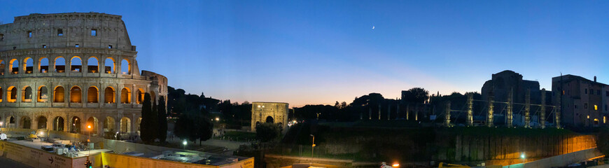 Fototapeta na wymiar Colosseum Rom Roma evening blue sky architecture