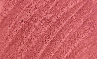 Cosmetic texture mask clay powder red. Selective focus.