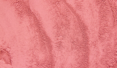Cosmetic texture mask clay powder red. Selective focus.