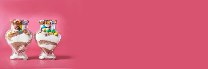 Valentine's Day. panorama. valentine's day gift jar with dessert