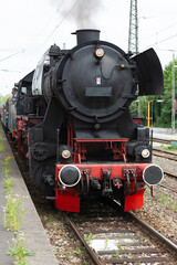 Fototapeta premium Steam locomotive with classic tubular boiler and piston steam engine
