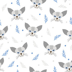 Seamless Pattern with cat faces. Vector illustration.