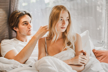 Young just married couple traveling in camper,house on wheels,trailer,motor home.Love romantic road travel,freedom life. Small bed,bedroom in van.Wanderlust vacation,weekend. Girl,guy,happy adventure