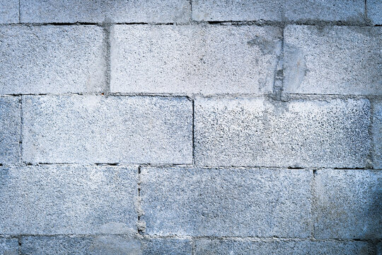 Fototapeta Natural gray brick texture. Concrete block wall background.