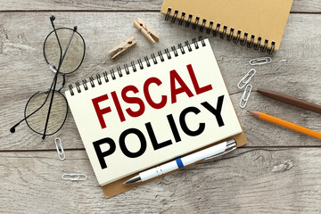 fiscal policy notebook on a wooden table