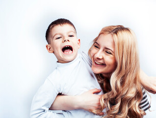young modern blond mother with cute son together happy smiling family posing cheerful on white background, lifestyle people concept, sister and brother friends