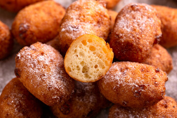 Homemade cottage cheese donuts with powdered sugar