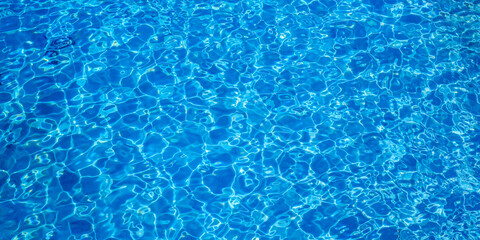 Close-up view of a transparent turquoise sea water that forms a natural texture in Malta