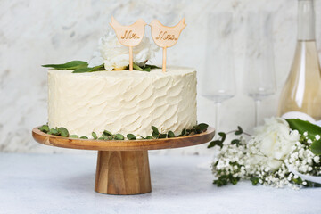 Obraz na płótnie Canvas Dessert stand with beautiful wedding cake on table