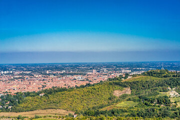 Fototapeta na wymiar Panoramic view of the cityscape of Bologna from Santuario della Madonna di San Luca