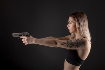sexy woman holding gun