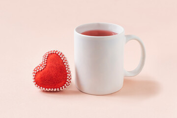 White mug mockup and handmade heart shaped gingerbread