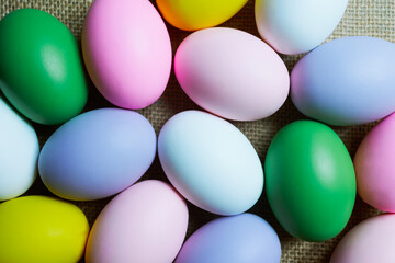 Colorful Easter eggs as background, top view. Happy Easter concept. Preparation for holiday. Many multicolor easter eggs. Easter background. 