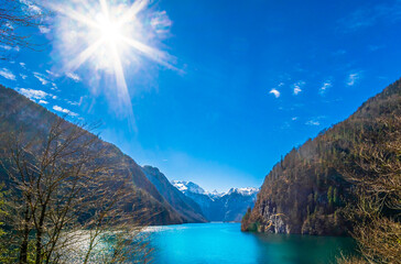 Majestic view of the Koenigssee between snow covered mountains at Berchtesgaden at winter