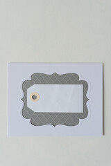 die cut card with fancy window opening and paper tag
