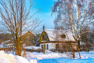 country winter landscape with the image of a village