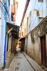 Fototapeta na wymiar Typical narrow street in Stone Town, Zanzibar, Tanzania