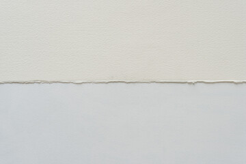 paper background with focus on deckle edge