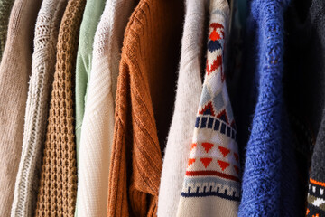 Closeup view of different knitted sweaters