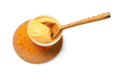 Bowl with turmeric mask and powder on white background