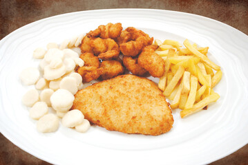 A Large Fisherman's Platter Dish Over a Dark Background