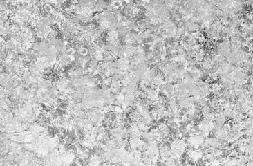 The texture of a concrete or plastered wall for the background.
