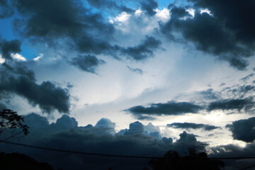 Fototapeta na wymiar Dark storm clouds at dusk.