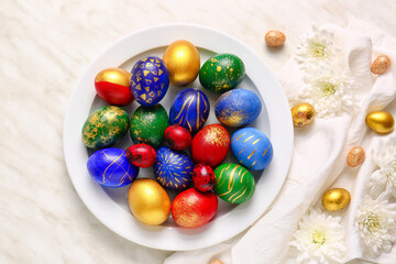 Plate with stylish Easter eggs  on light background