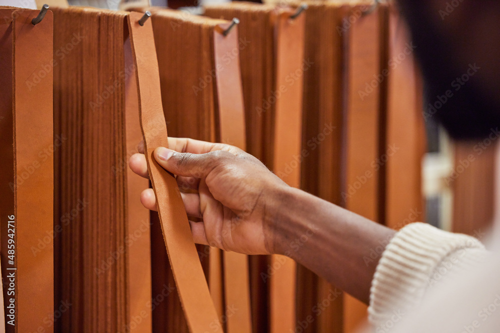 Poster dont get distracted, stay focused on the goal. shot of a unrecognizable man working at his job in a 