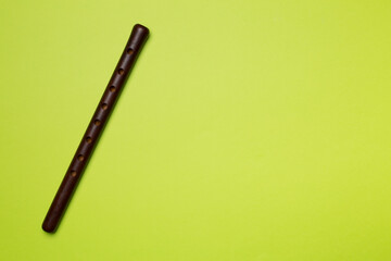 Armenian national musical instrument duduk on color background. Top view