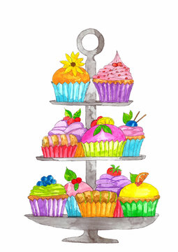 Colorful cupcakes on cake stand