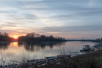 Typical boats moored on the river Po, Cremona