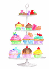Colorful cupcakes on cake stand