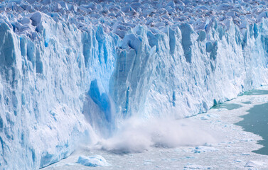 Glacial ice calving.