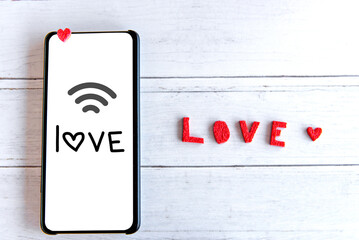 Valentine's day concept, smartphone with copy space.