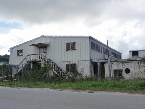 Ruins of an abandoned building which used to be a garment factory in Saipan, CNMI