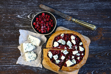 Homemade galette with cranberries and blue cheese.