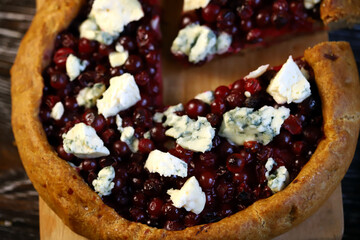 Homemade galette with cranberries and blue cheese.